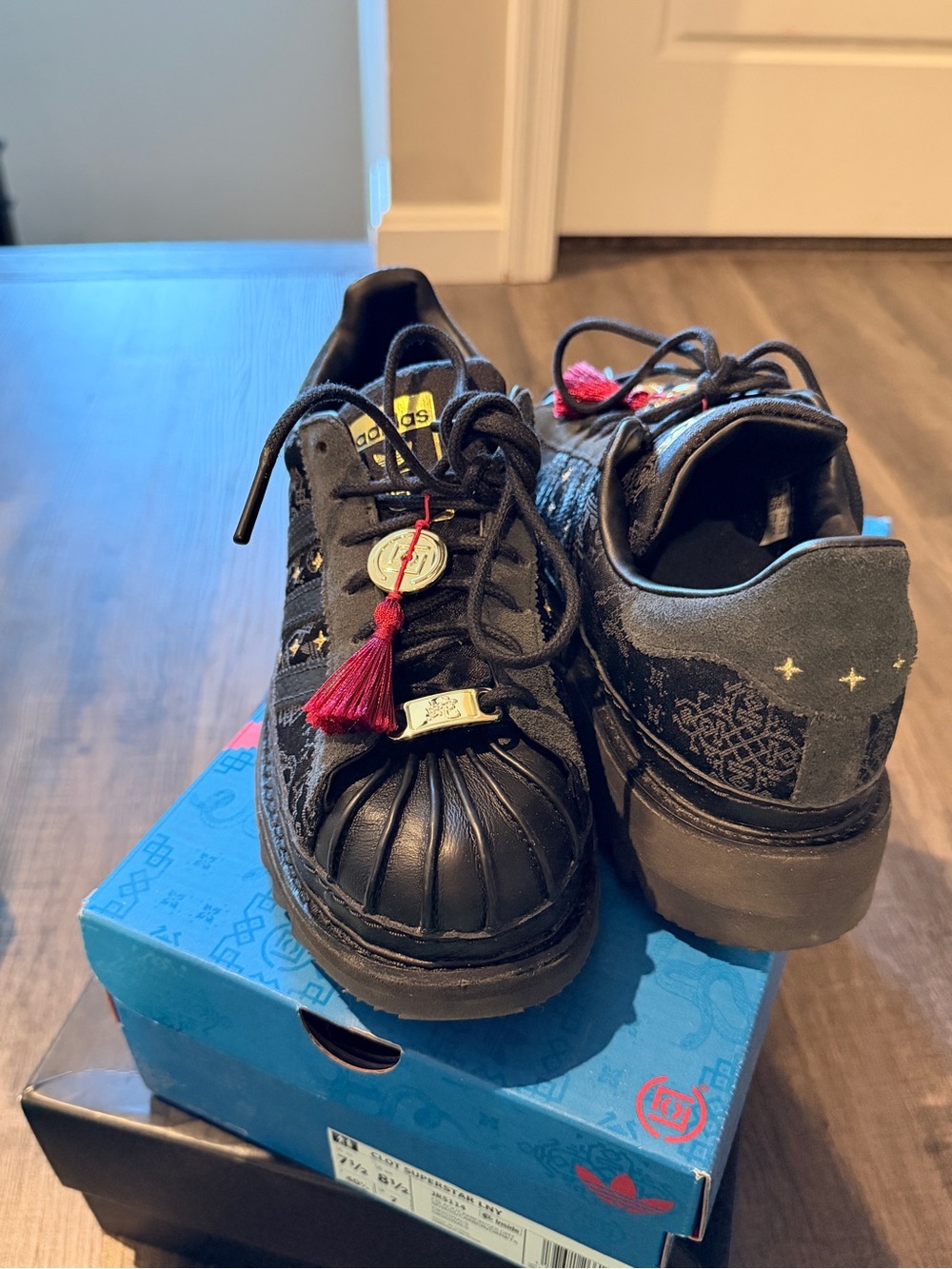 Black Lace-Up Shell Toe Sneakers with Tassel Accent
